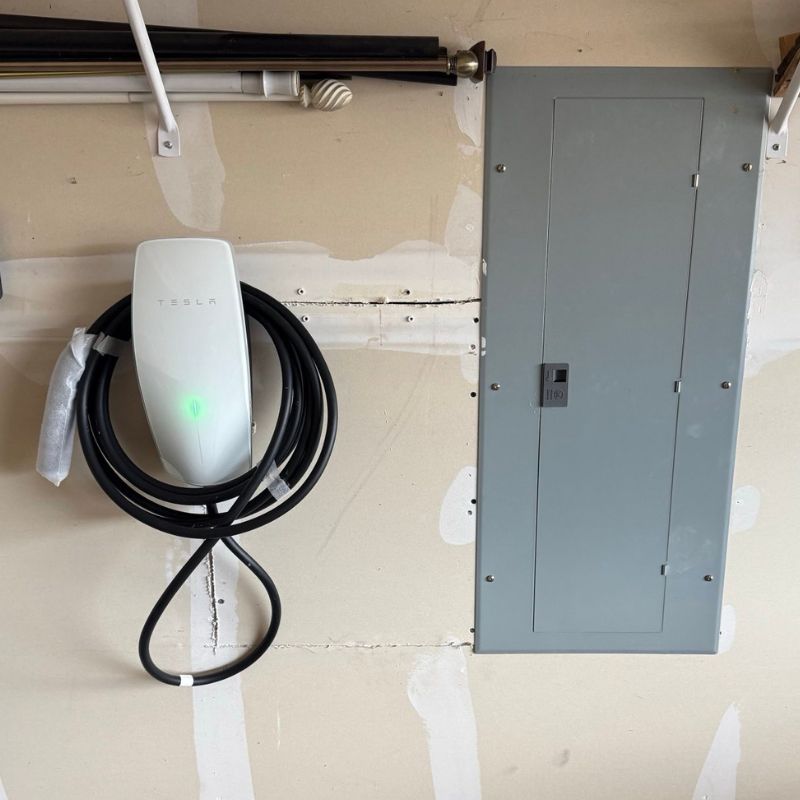 Tesla Wall Connector installation in Colorado Springs garage with panel upgrade
