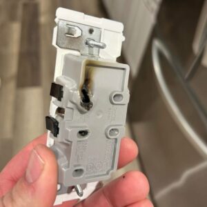 bad outlet sparking and fire damage