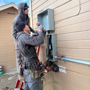 crew installing a new panel