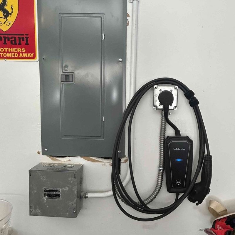 Level 2 EV charger installed for a high-performance electric vehicle by The Electricians in Denver